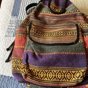 Multi colored cotton backpack.